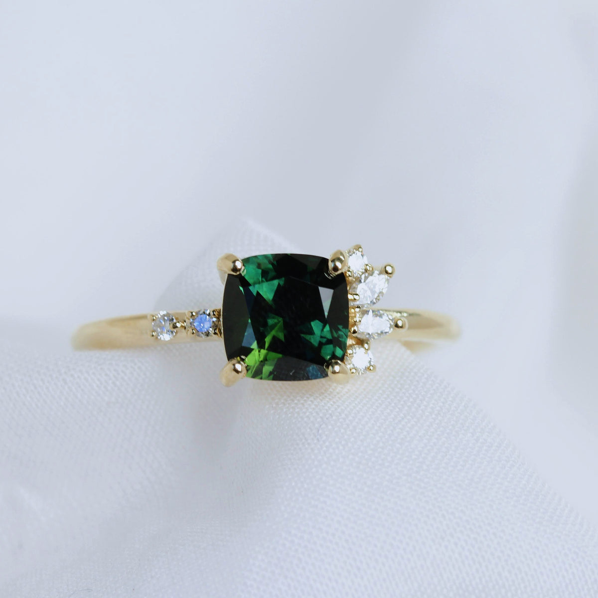 Green sapphire and diamond ring